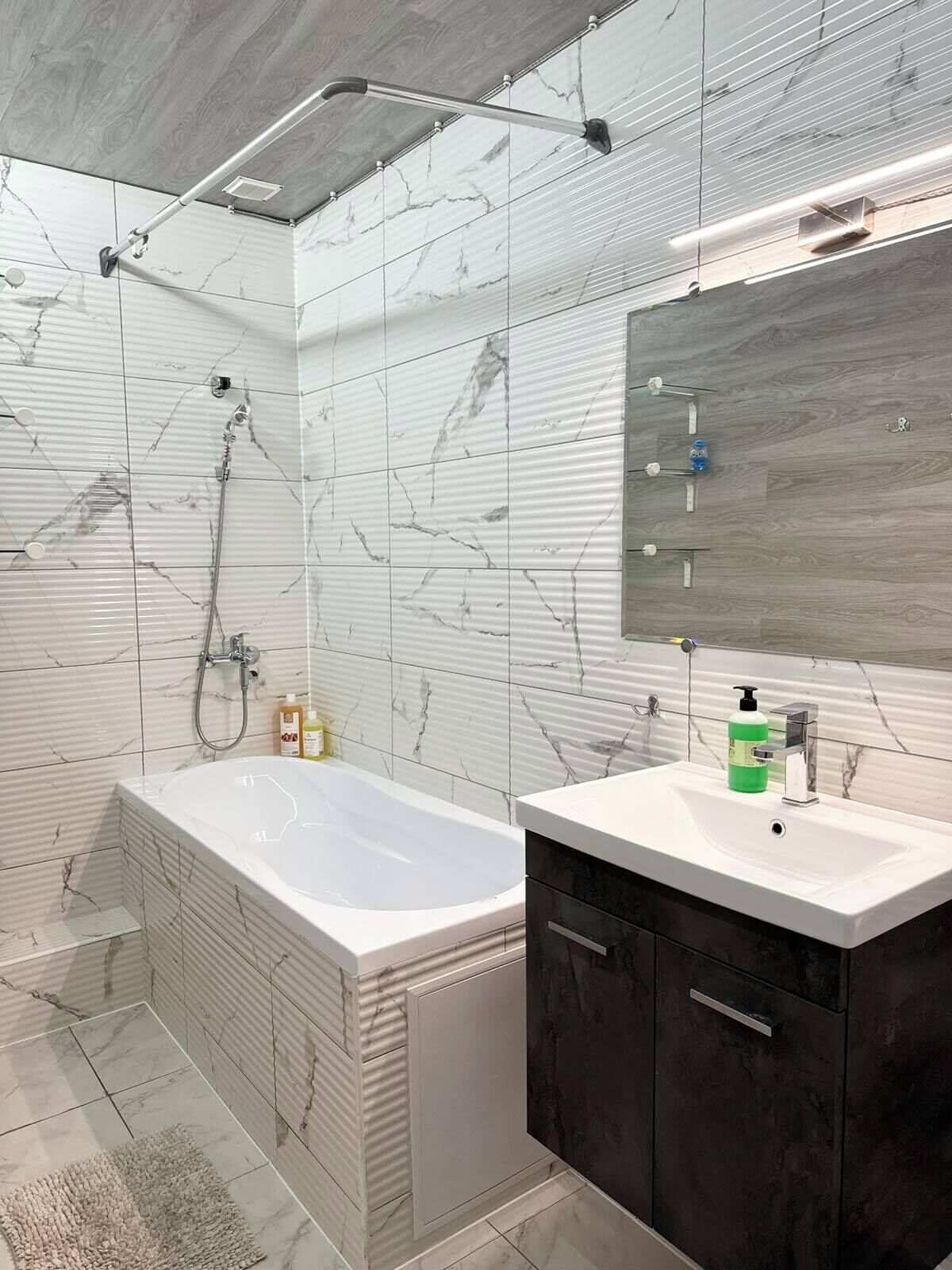 Economy Quadruple Room, Courtyard View | Bathroom | Towels, soap, toilet paper