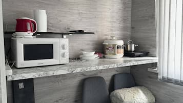 Luxury Quadruple Room | Premium bedding, soundproofing, iron/ironing board, free WiFi