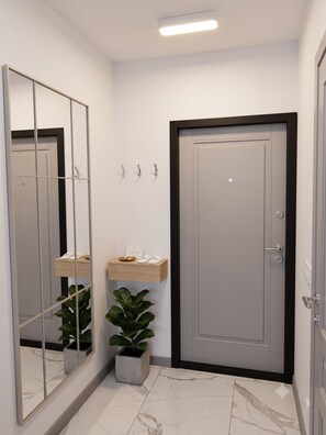 Basic Quadruple Room | Ruang tamu