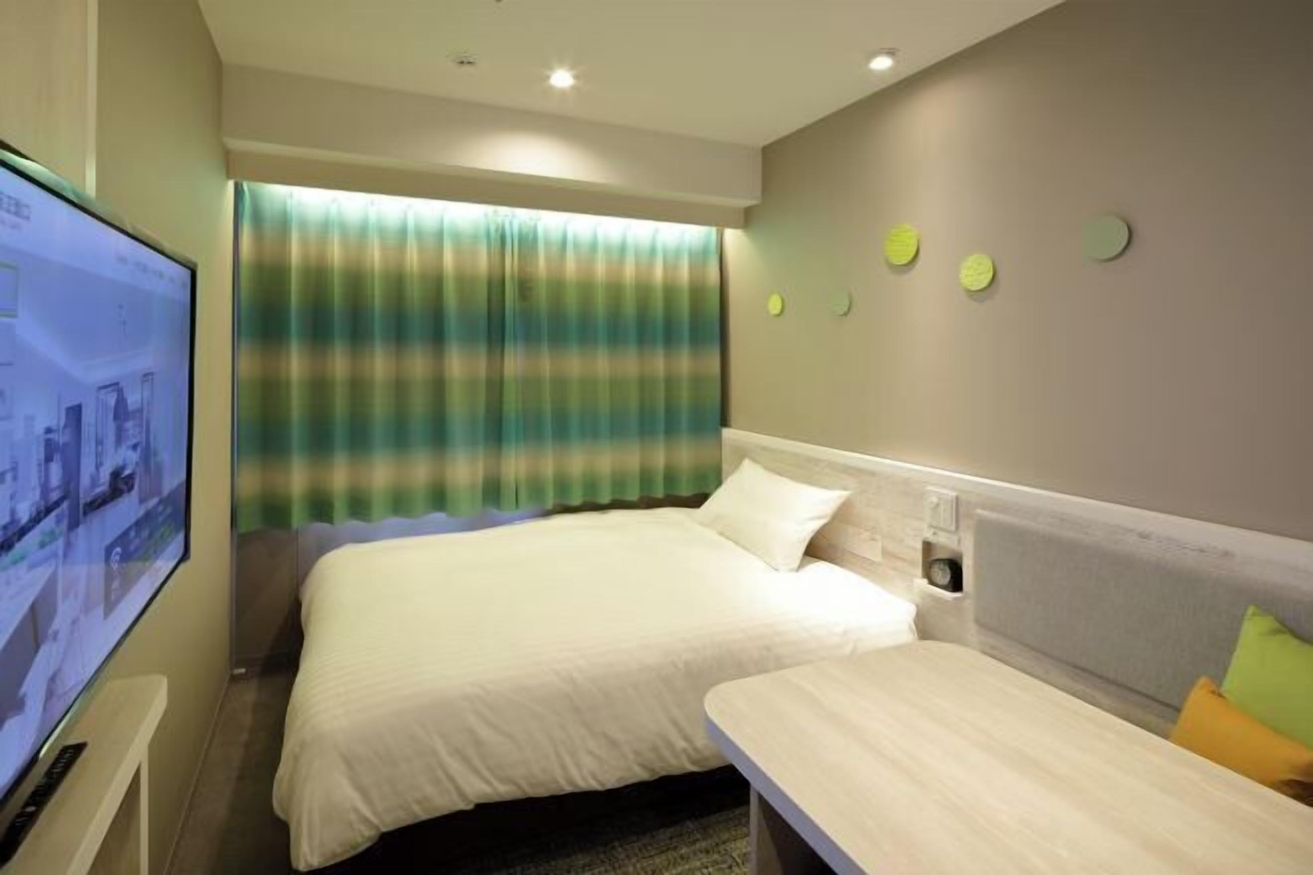 Down duvets, desk, laptop workspace, blackout curtains