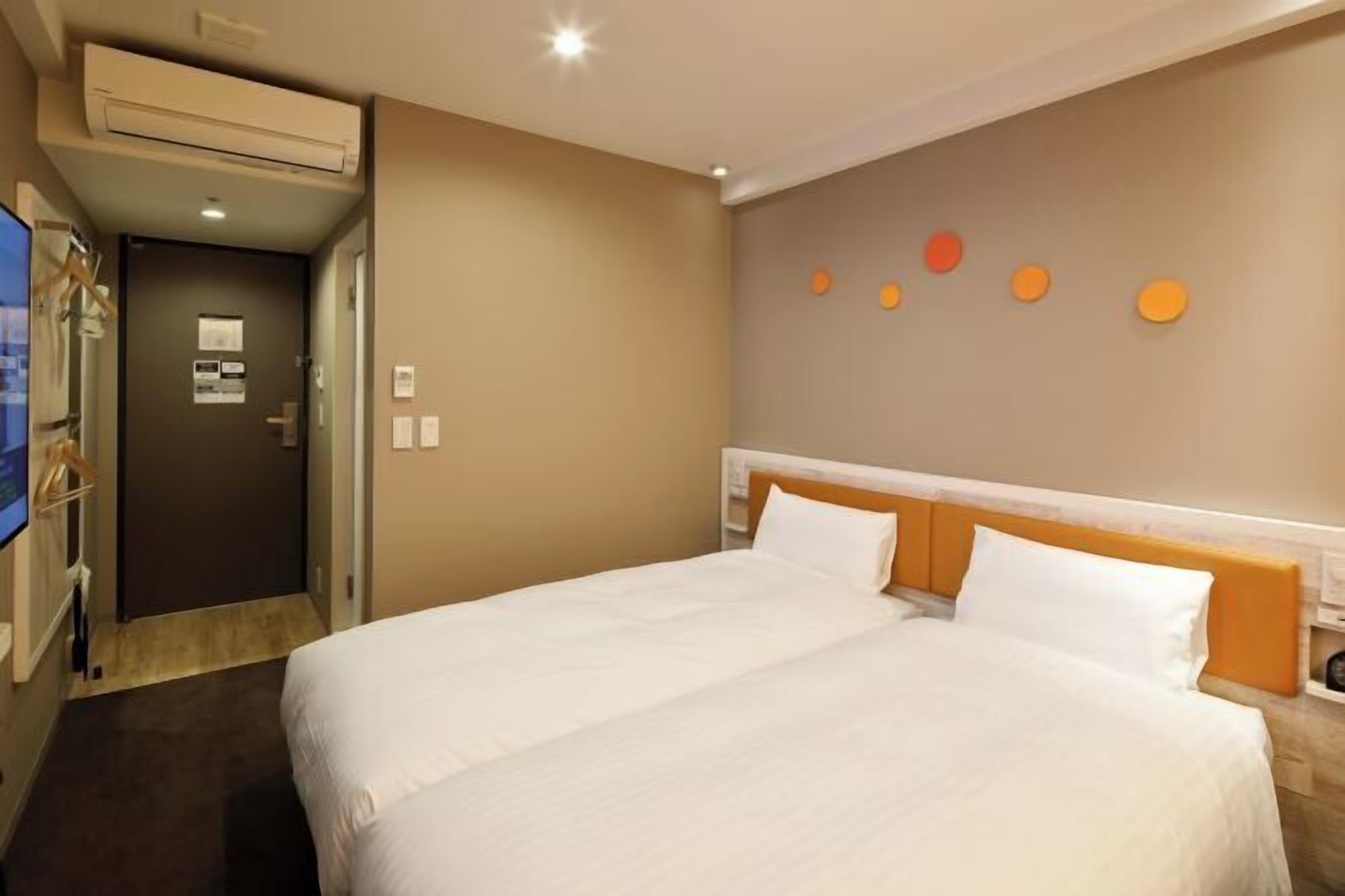 Down duvets, desk, laptop workspace, blackout curtains