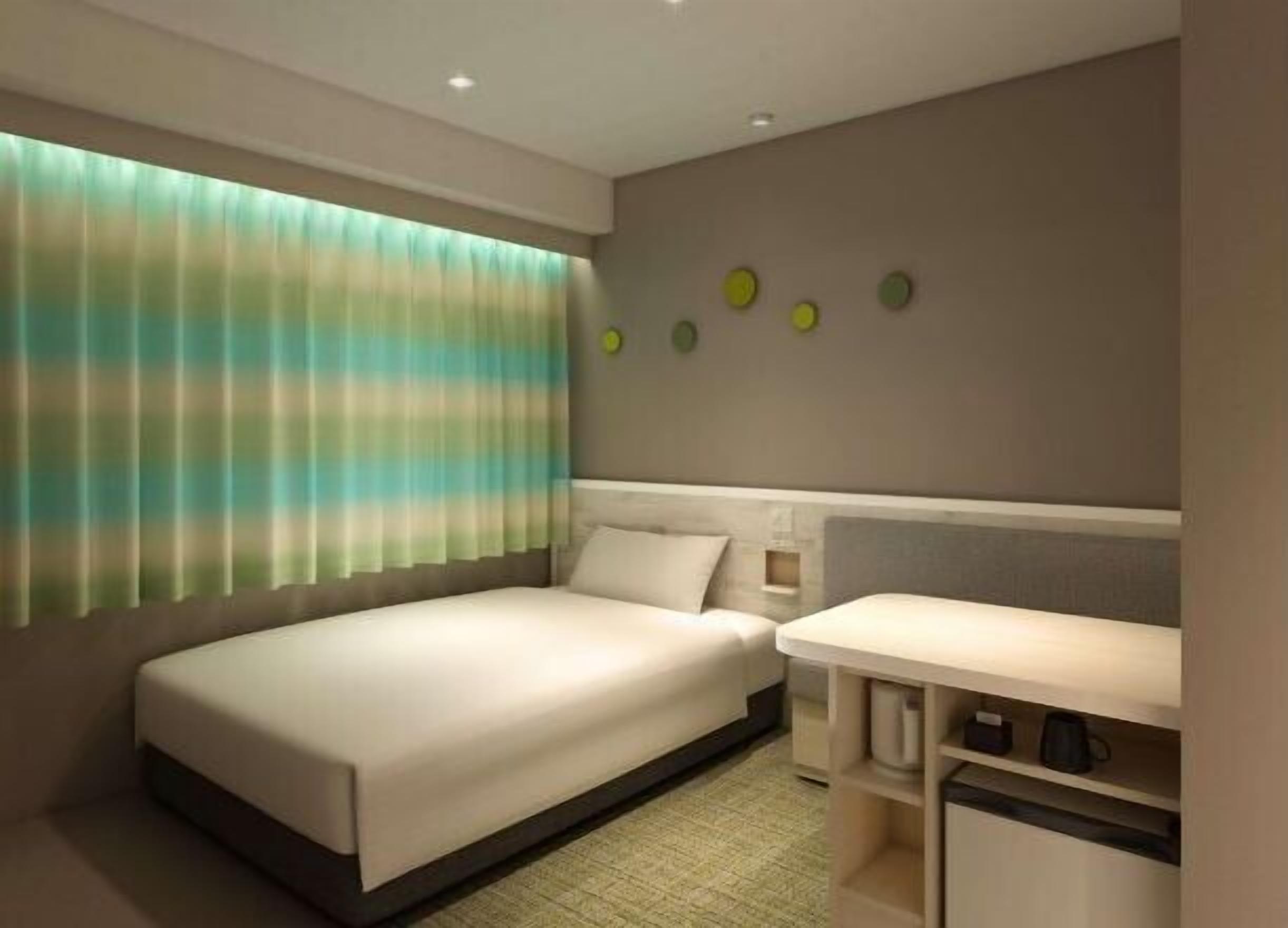 Down duvets, desk, laptop workspace, blackout curtains