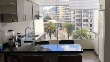 Standard Apartment, 2 Bedrooms | Private kitchen | Fridge, microwave, stovetop, electric kettle