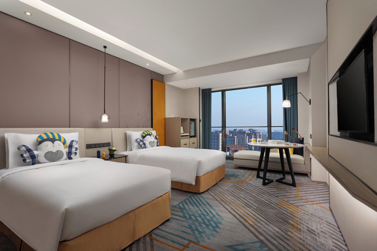 Ropa de cama de alta calidad, edredón y minibar 