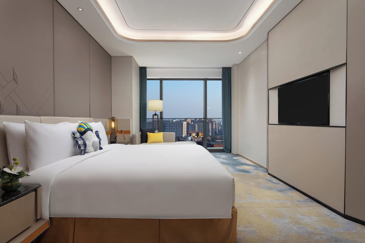 Suite, 1 Bedroom, City View | 1 bedroom, premium bedding, minibar, in-room safe