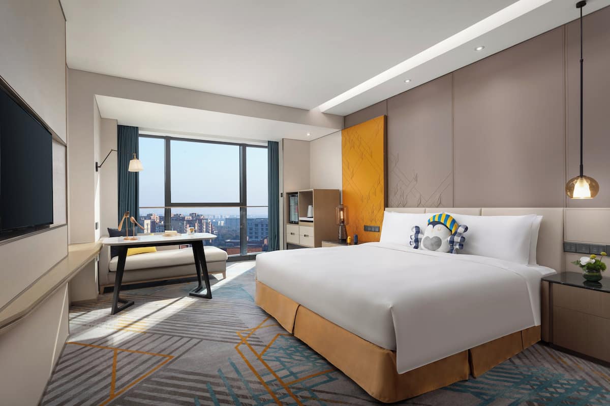 Premium bedding, down duvets, minibar, in-room safe