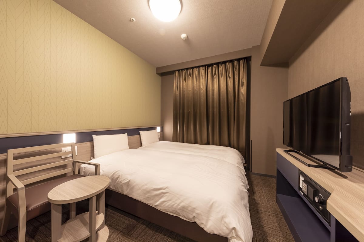 In-room safe, desk, laptop workspace, blackout curtains