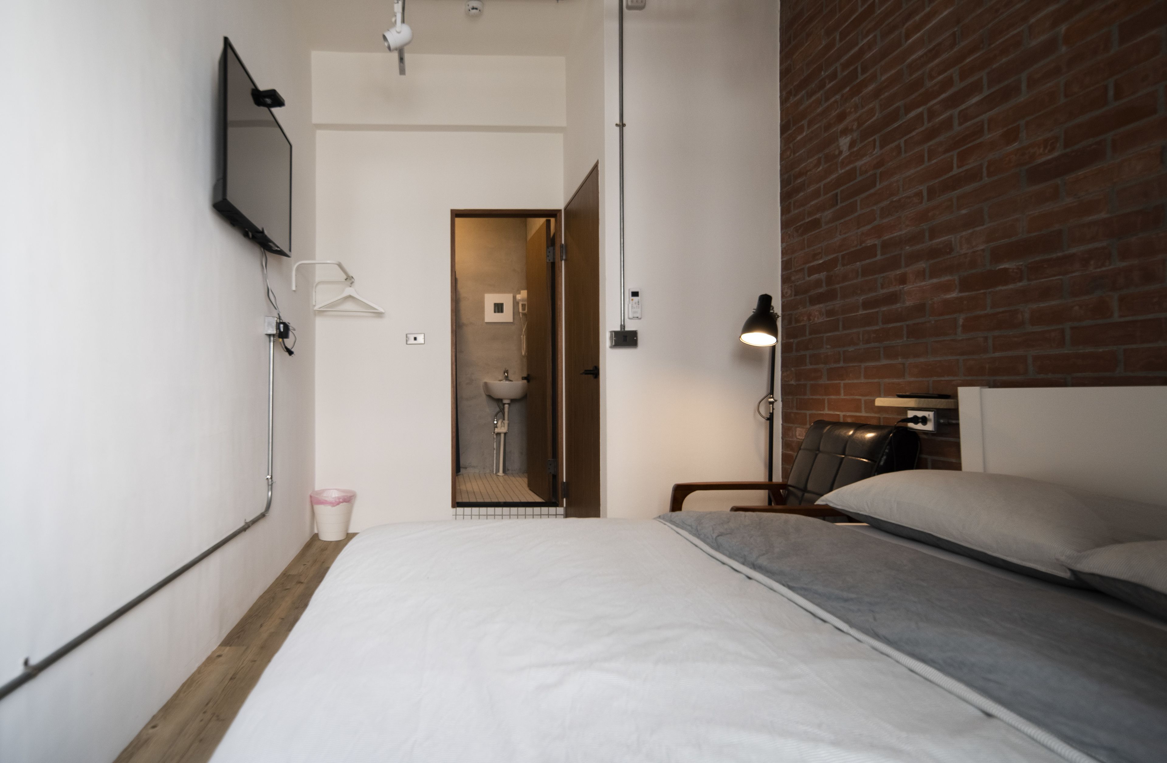 Habitación doble, baño privado | Cortinas blackout y ropa de cama 