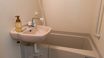 Quadruple Room | Bathroom | Separate tub and shower, deep soaking tub, hair dryer, towels