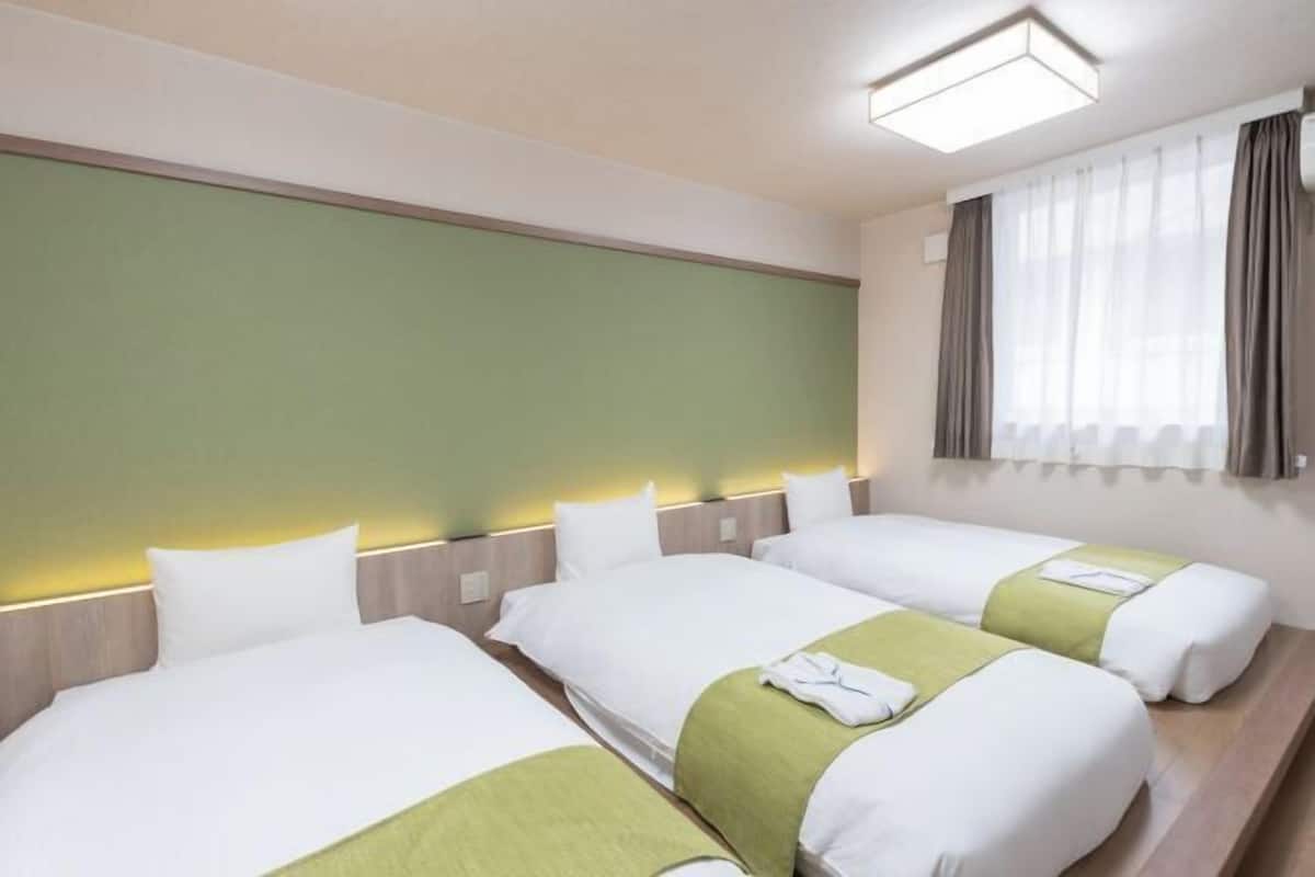 Down duvets, blackout curtains, iron/ironing board, free WiFi