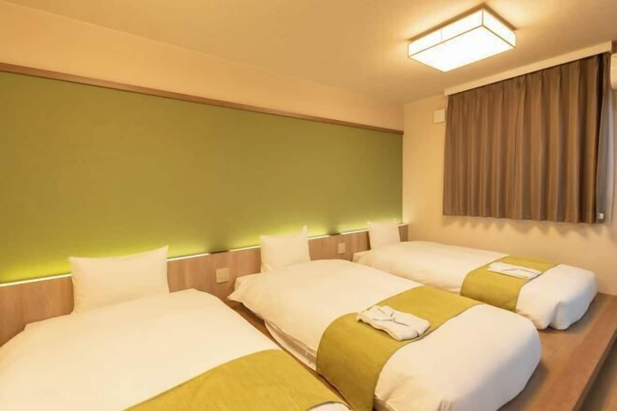 Down duvets, blackout curtains, iron/ironing board, free WiFi