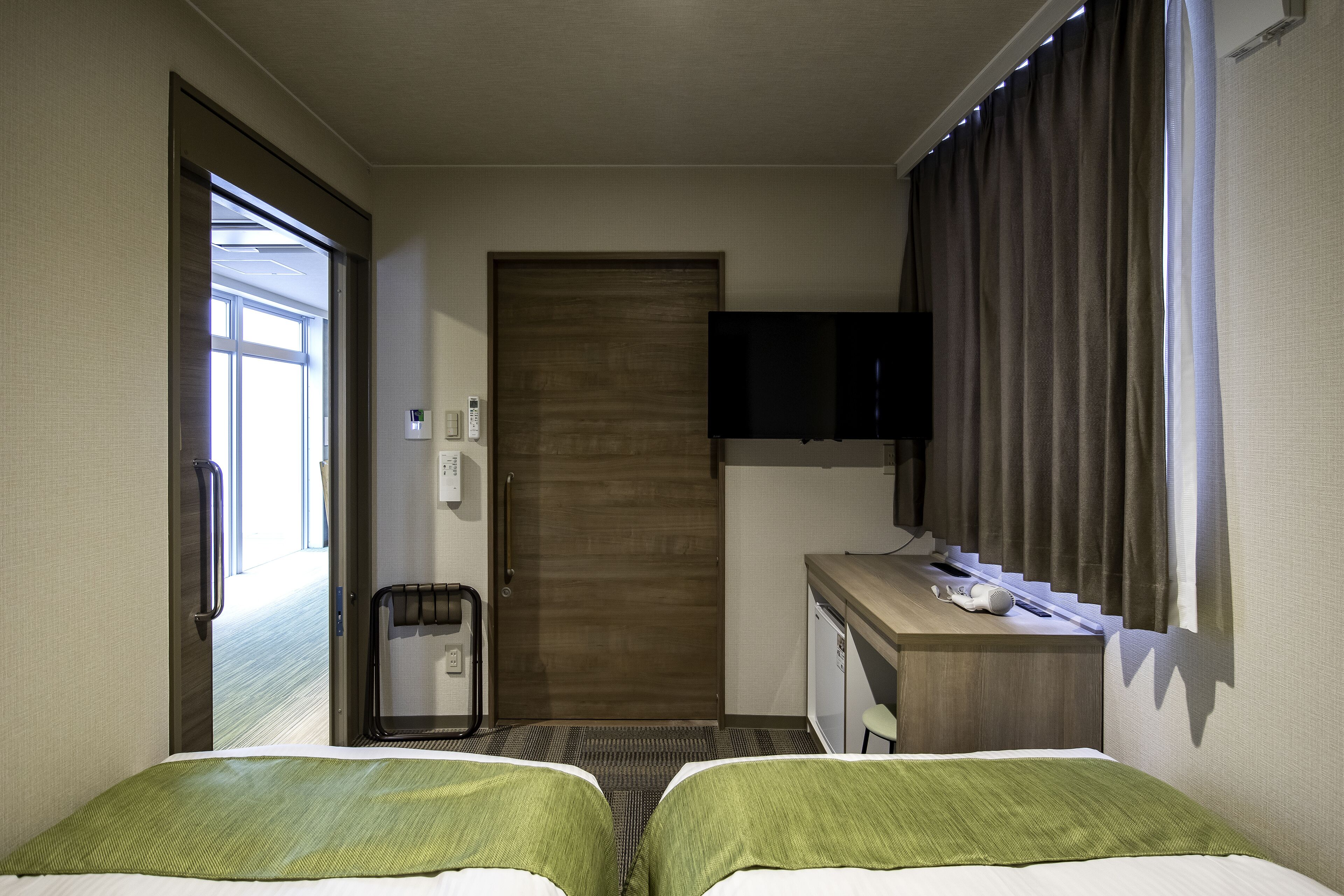 universal twin room | 1 bedroom, down duvets, blackout curtains, iron/ironing board