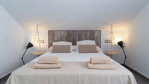 Iron/ironing board, travel crib, free WiFi, bed sheets