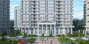 A multi-story residential building with a central entrance, surrounded by well-maintained gardens and a parking area. - Delux Smart Apartments Liverpool (Kyiv)