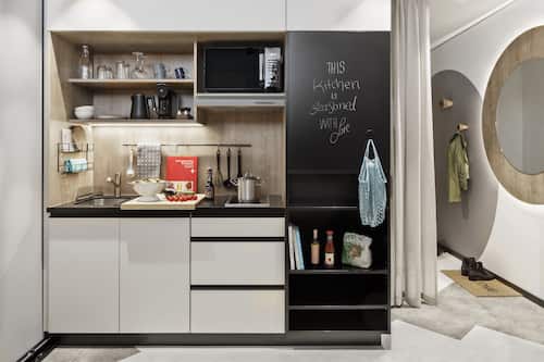 Full-sized fridge, microwave, stovetop, dishwasher