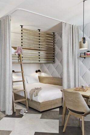 A bedroom with a bunk bed, a desk, a chair, and a ladder. - Stay KooooK Bern Wankdorf – Online Check In (Bern)