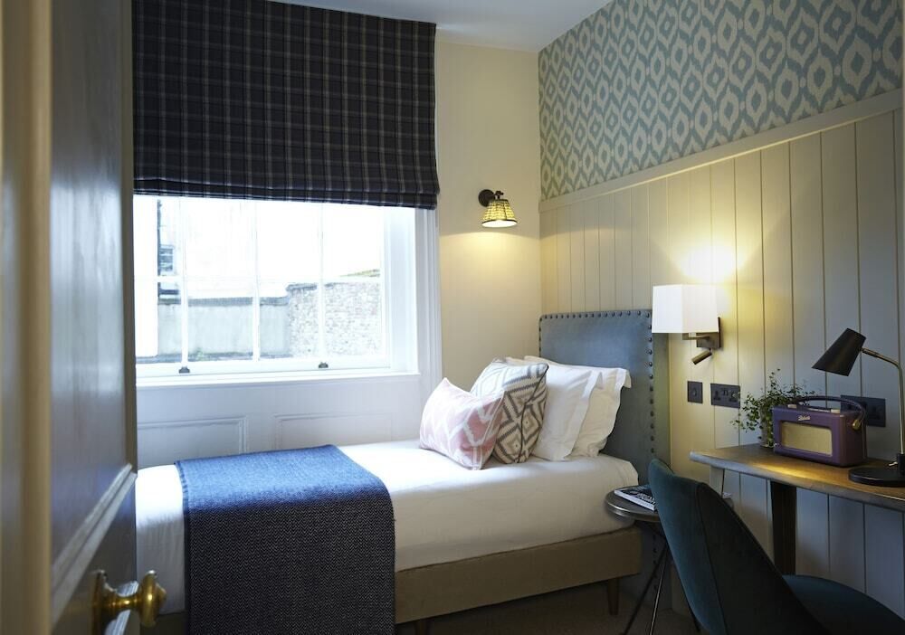 Premium bedding, in-room safe, individually decorated
