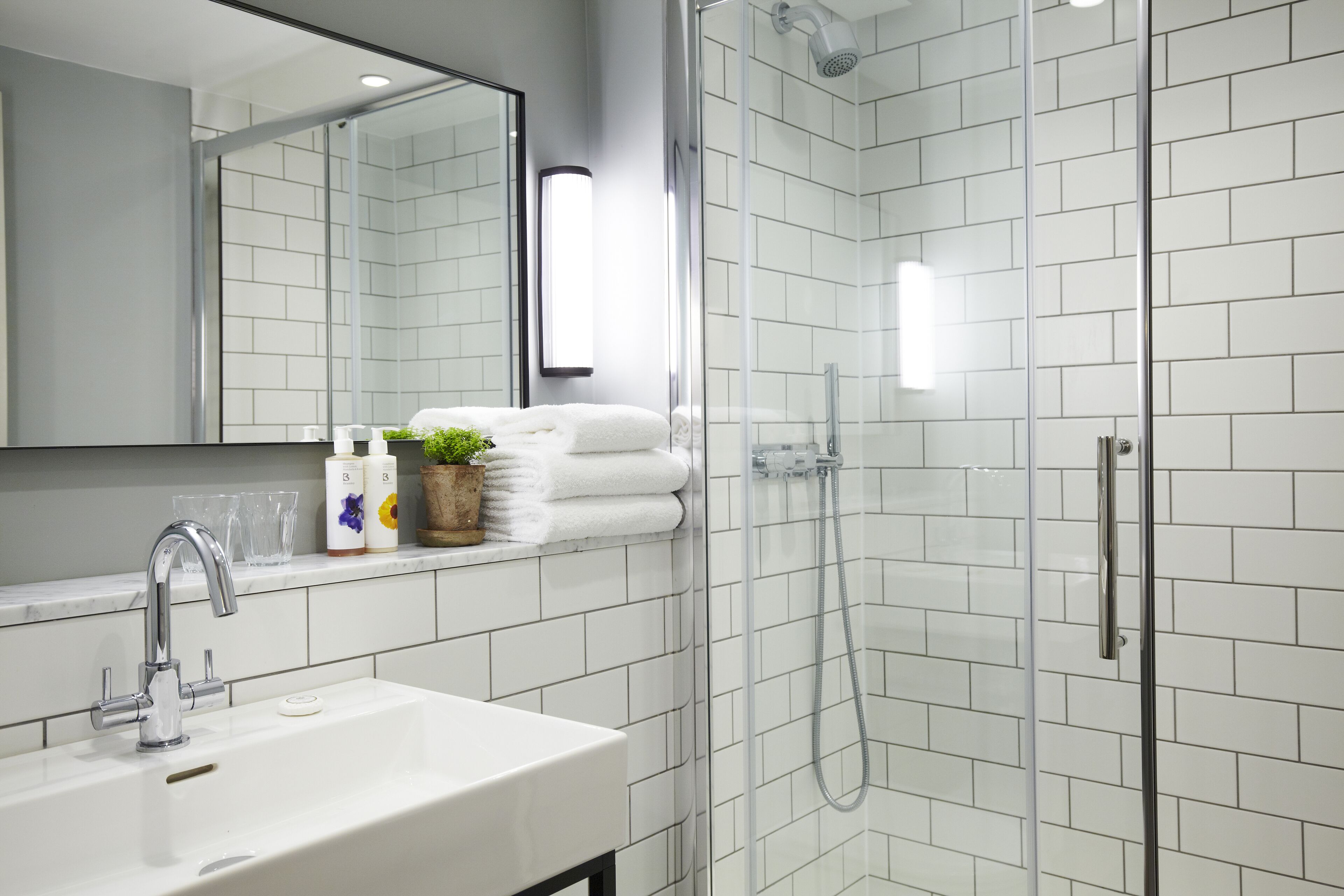 shower, free toiletries, hair dryer, towels