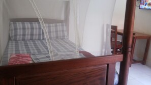 Individually decorated, desk, laptop workspace, blackout drapes