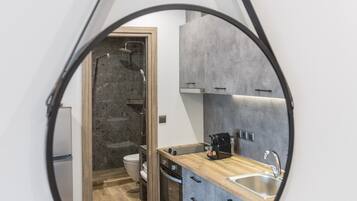 Suite junior | Área de sala de estar | Smart TV