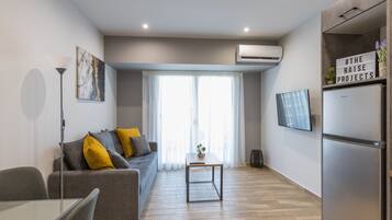 Suite Confort | Área de sala de estar | Smart TV