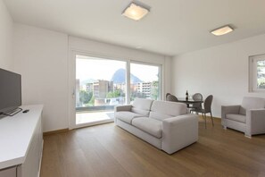 Apartment, 1 Bedroom (ROGGIA 16 - Fourth Floor) | Living area | Flat-screen TV - Roggia Apartments (Lugano)