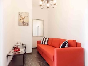 Departamento clásico, 2 habitaciones | Área de sala de estar | Smart TV y Netflix 
