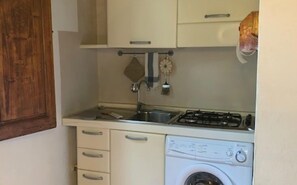 Apartment, 1 Bedroom | Private kitchenette | Full-sized fridge, microwave, stovetop, cookware/dishes/utensils - Cavour Apartment (Florence)