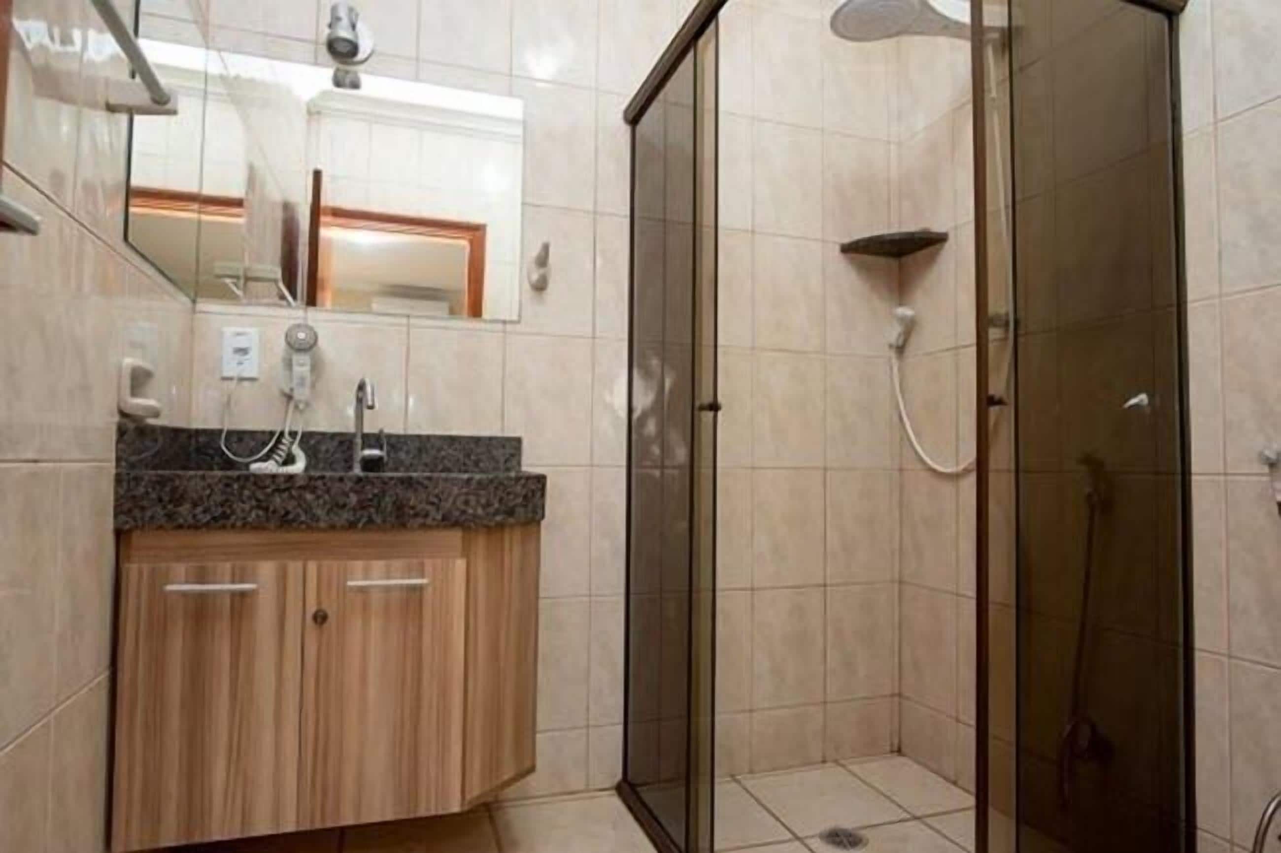superior double room | bathroom | shower, hair dryer, towels