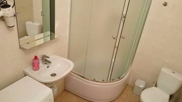 Apartment | Bathroom | Shower, hair dryer, slippers, towels