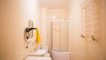 Apartment, 1 Bedroom | Bathroom | Shower, hair dryer, slippers, towels