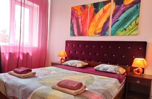 1 dormitorio, sistema de insonorización, tabla de planchar con plancha