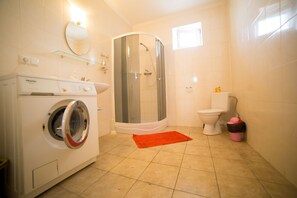 Apartment, 1 Bedroom | Bathroom | Shower, hair dryer, towels, soap - Best One Room Apartments (Mukachevo)