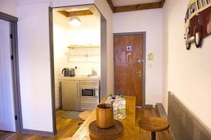 Apartamento, 1 cama de casal e sofá-cama | Área de estar | TV de tela plana