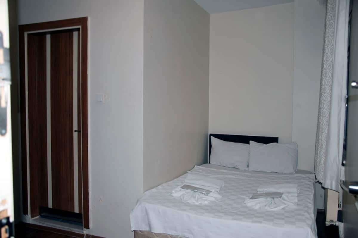 Lakens van Egyptisch katoen, luxe beddengoed, een minibar