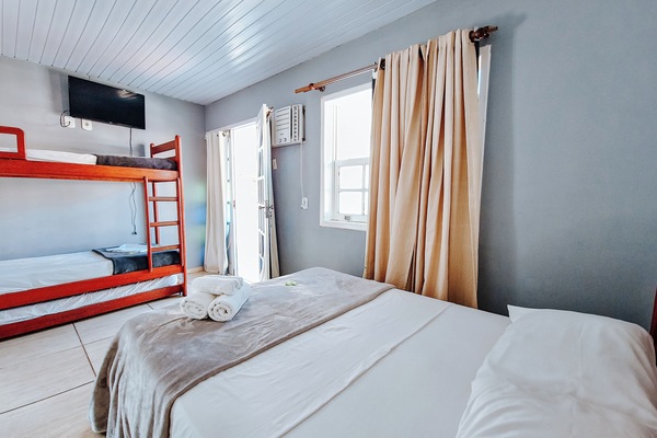 Family Quadruple Room | Minibar, in-room safe, WiFi (free), bed sheets
