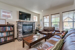 Flat-screen TV, fireplace
