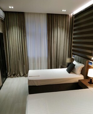 패밀리 더블룸 또는 트윈룸 | 객실 내 금고, 암막 커튼, 방음 설비, 다리미/다리미판