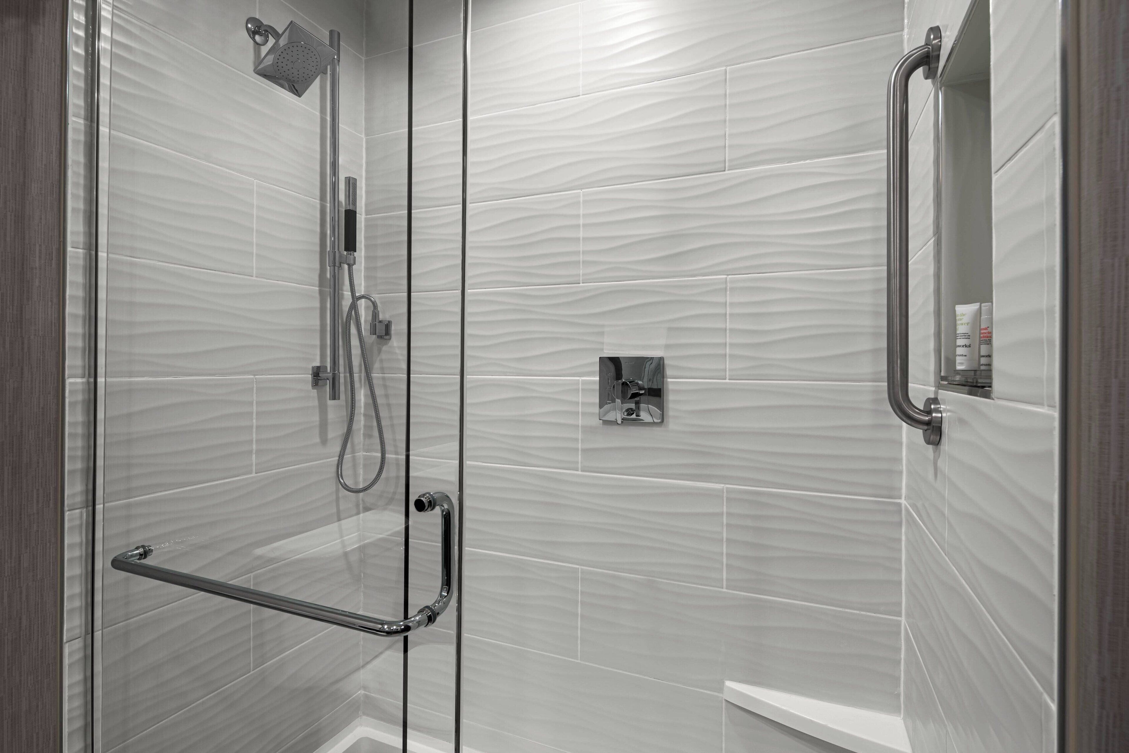 combined shower/bathtub, free toiletries, hair dryer, towels