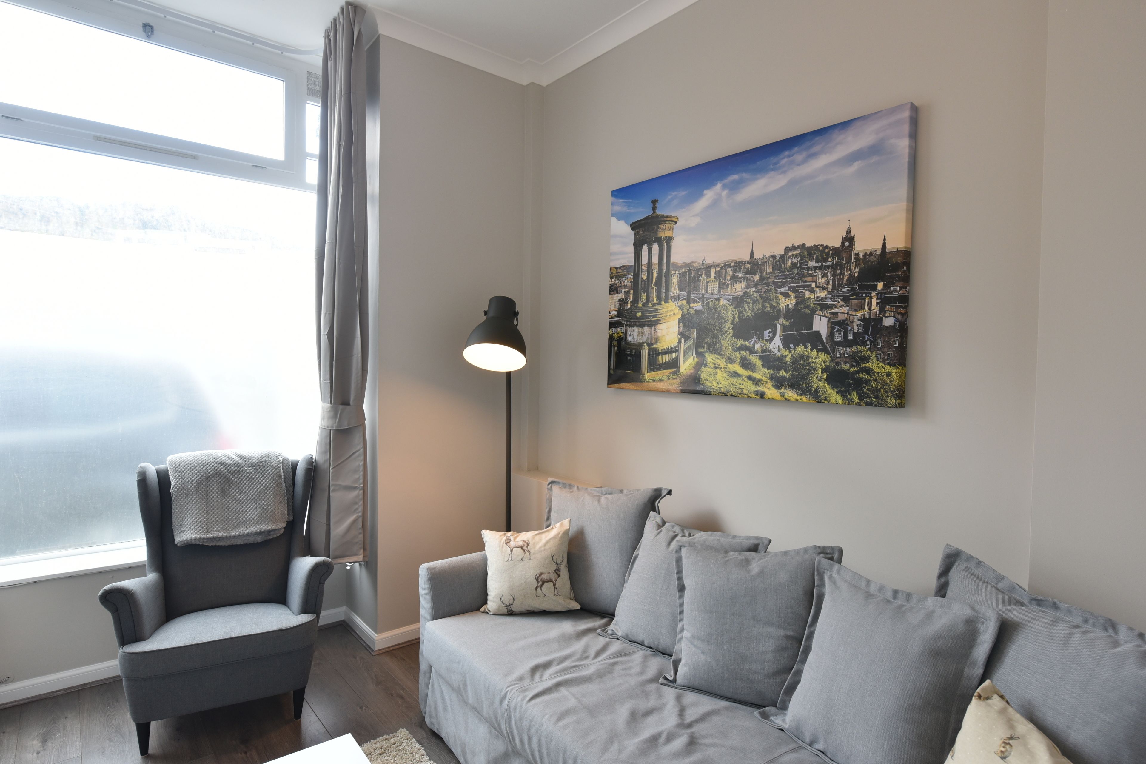 Luxury Apartment | Living room | 50-inch flat-screen TV with cable channels, Smart TV, tablet