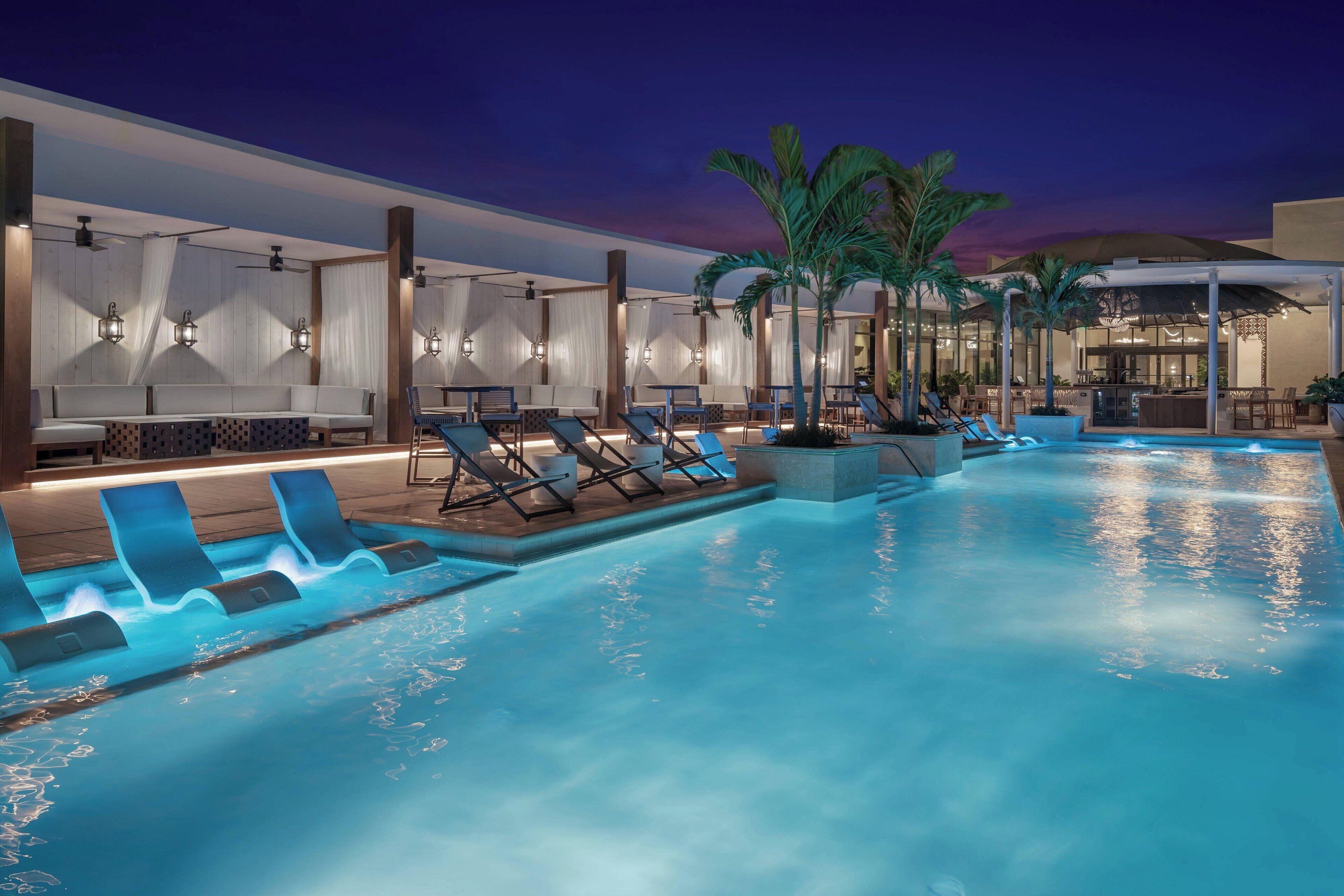 outdoor pool, pool umbrellas, pool loungers