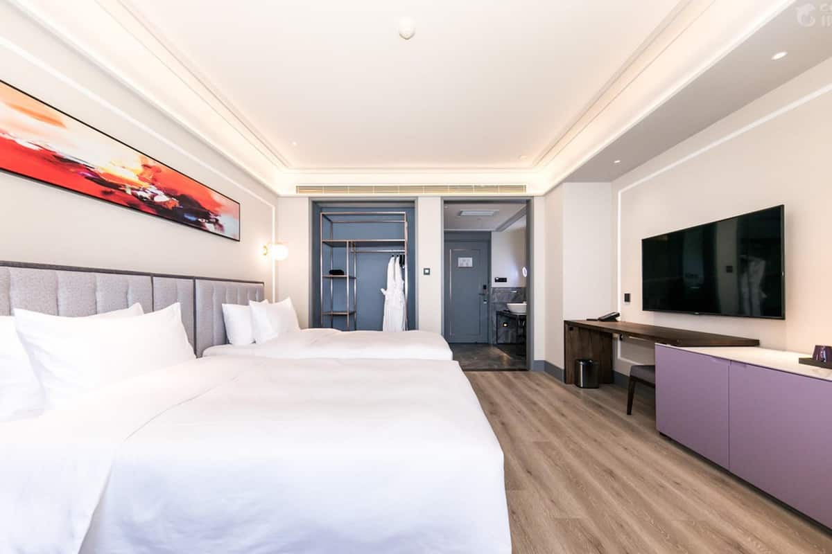 In-room safe, blackout drapes, iron/ironing board, bed sheets