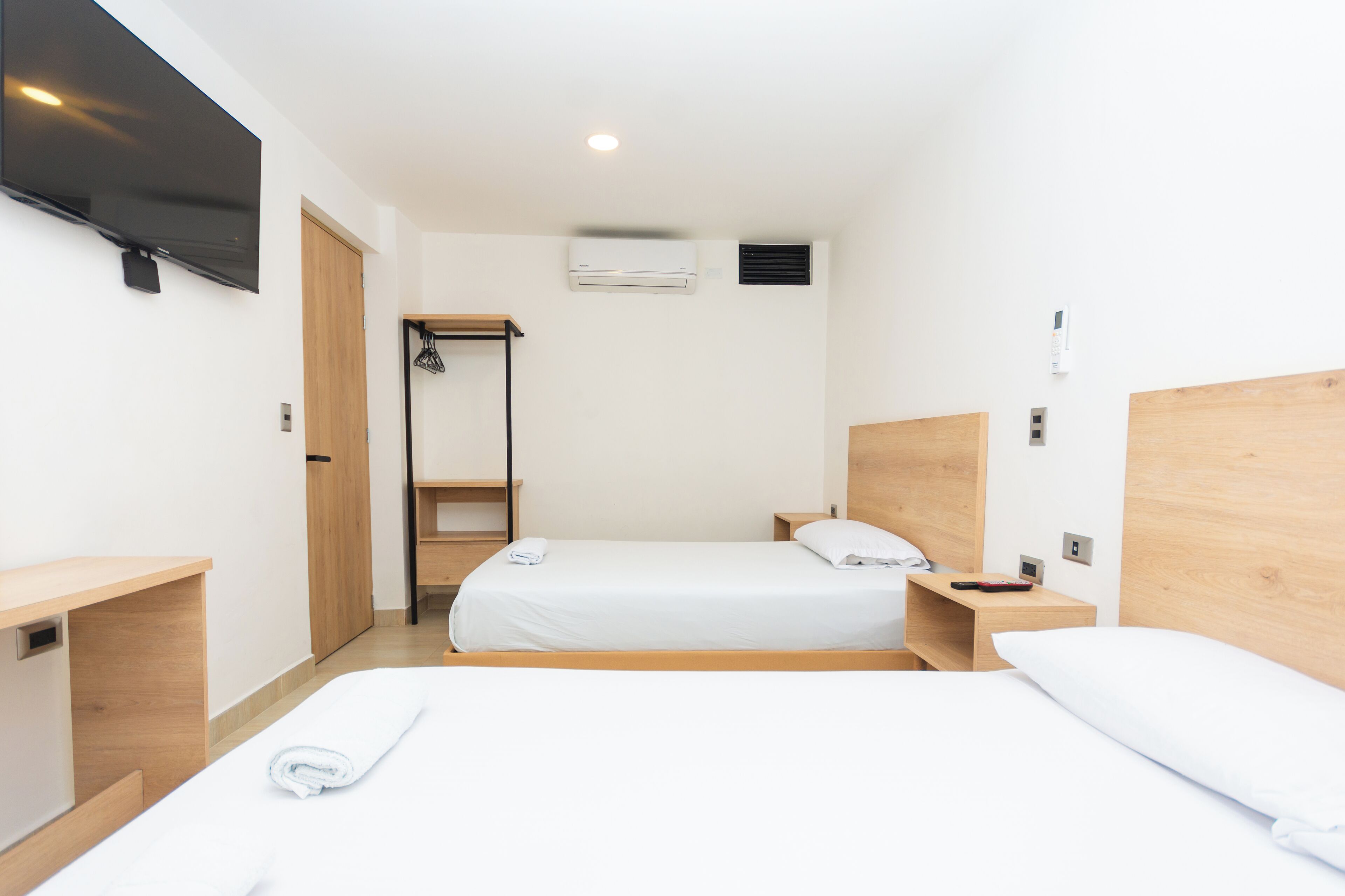 Superior-Dreibettzimmer | Hochwertige Bettwaren, kostenloses WLAN, Bettwäsche