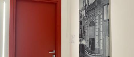 A red door with the number 404, a keyhole, and a door handle.
