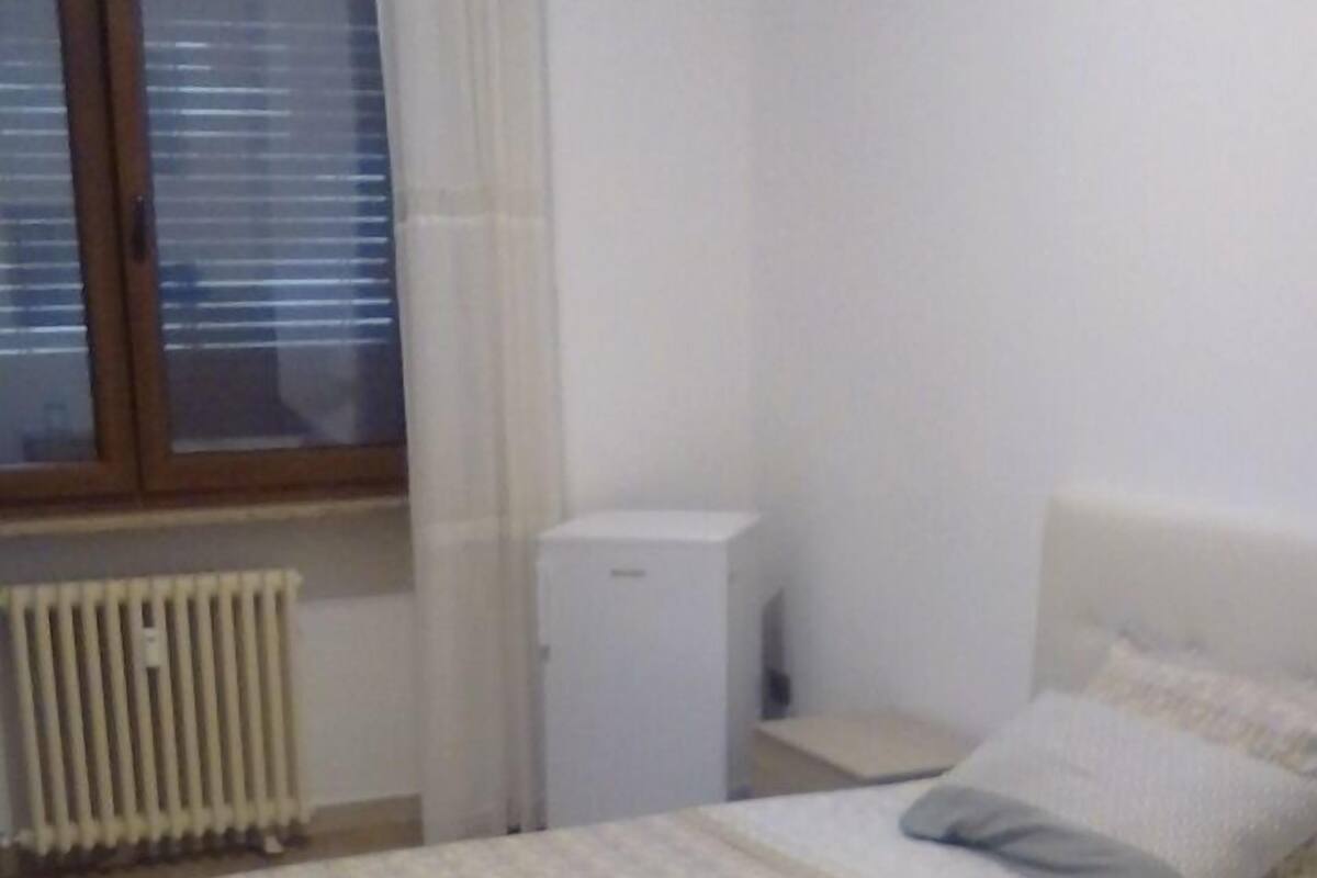 Camera, bagno privato (External) | 2 camere, minibar, una scrivania, ferro/asse da stiro