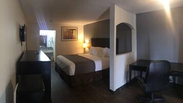 Habitación individual Deluxe | Cortinas blackout, tabla de planchar con plancha y wifi gratis