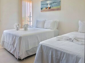 Quarto triplo, 3 quartos | Escrivaninha, ferros/tábuas de passar roupa, Wi-Fi de cortesia