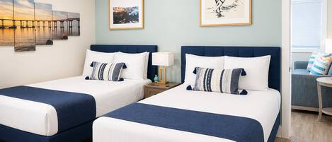 Family Suite, Multiple Beds, Kitchen | Iron/ironing board, WiFi (free), individually decorated, bed sheets
