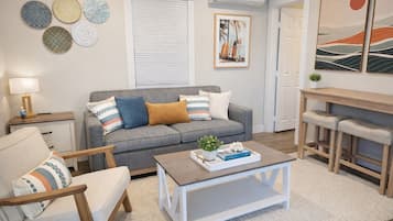 Family Suite, Multiple Beds, Kitchen | Living area