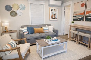 Family Suite, Multiple Beds, Kitchen | Living area | Smart TV